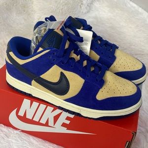 Women’s Nike Dunk Low. Deep Royal Blue- Dark Obsidian. Size 7. Never been worn.